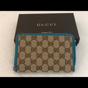 Gucci GG Logo Canvass Leather Zip Around